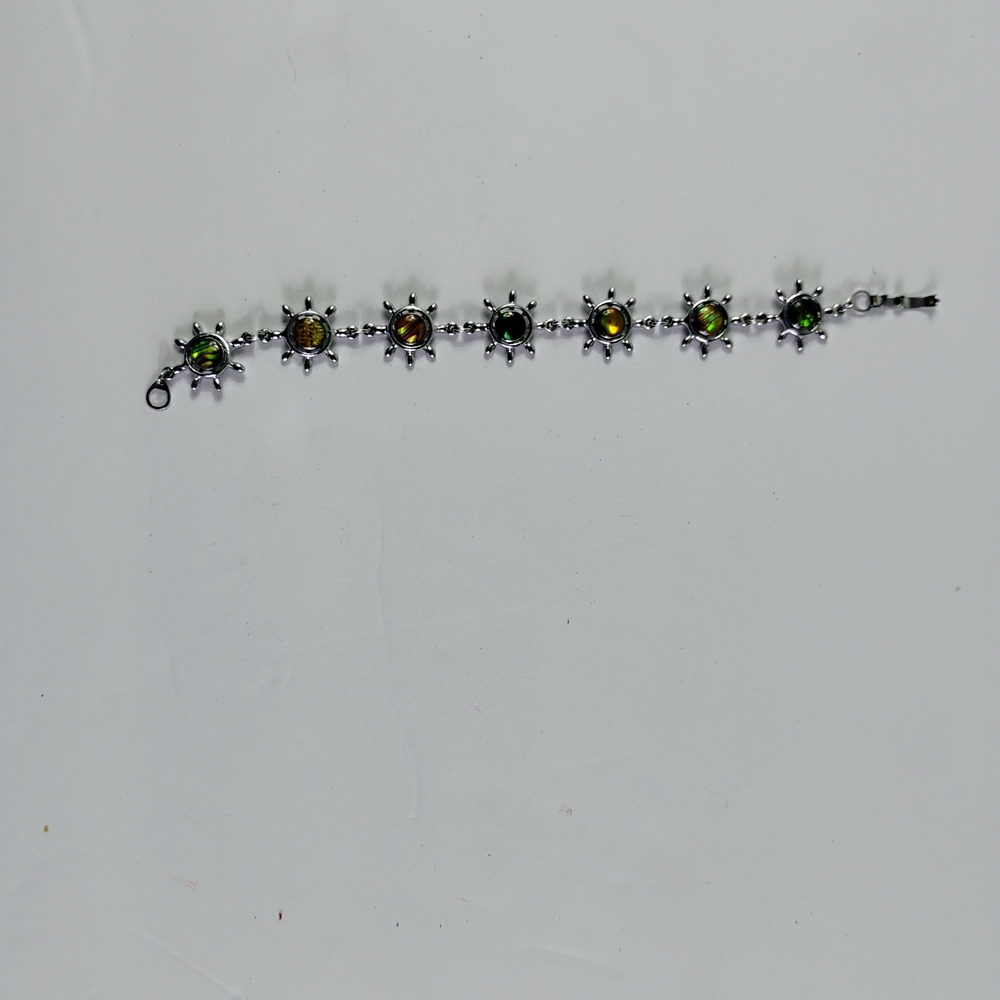 sterling silver bracelet featuring six multicolored Baltic amber cabochons